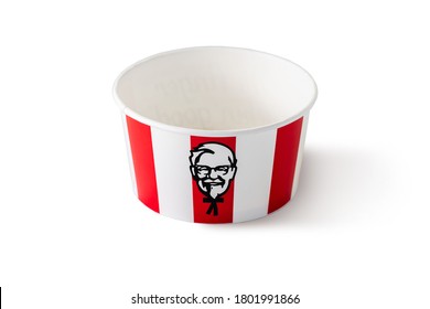 BANGKOK, THAILAND - August 24, 2020: KFC fried chicken bucket on white background. KFC is an American fast food restaurant chain known as Kentucky Fried Chicken. Illustrative editorial