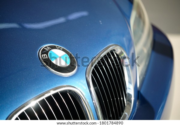 BANGKOK, THAILAND - AUGUST 24, 2020: Close up of BMW X3\
front grill with logo detail. Sports roadster car with shiny blue\
paint. BMW is German car manufacturer. Concept of car brand &\
company. 