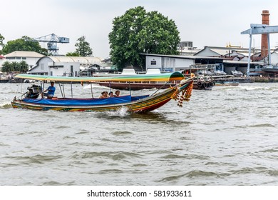 Bangkok, Thailand - August 28, 2016 : Boat driver service for Tourist the popular boat travel on the Chao Phraya river. To stay in downtown Bangkok. And tourist attractions on both sides of the river.