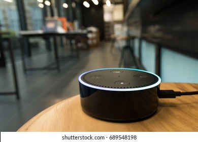 BANGKOK, THAILAND - August 4 : Selective focus on Amazon Echo dot version 2, the voice recognition streaming device from Amazon on table. August 4 2017 in Bangkok , THAILAND.