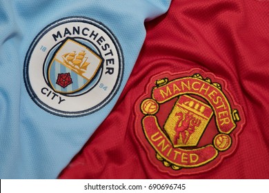 BANGKOK, THAILAND - AUGUST 5: Logo of Manchester City andManchester United  Football Club on the Jersey on August 5,2017 in Bangkok Thailand.