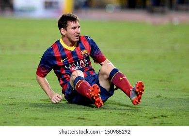 BANGKOK, THAILAND - AUGUST 7: Lionel Messi #10 Of FC Barcelona Reacts During The International Friendly Match Thailand XI And FC Barcelona At Rajamangala Stadium On August7,2013 In,Thailand.  