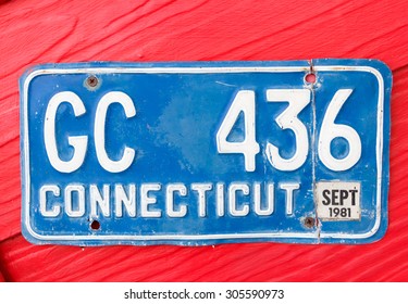 Bangkok, Thailand - August 8, 2015: Blue license plate number GC 436 of Connecticut, America on red wooden background at Chocolate Ville Park.