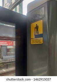 Bangkok, Thailand - Circa July 2019 : BTS Sky Railway Warning Sign On Side Door, Do Not Lean Against Platform Screen Doors. 