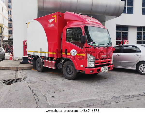 Bangkok, Thailand - Circa July 2019 :\
Post office\'s pickup truck parking on concrete\
floor.