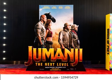 Bangkok, Thailand - Dec 20, 2019: Jumanji the next level movies logo advertising on backdrop poster standee in cinema theatre. Movie advertisement or film entertainment industry concept