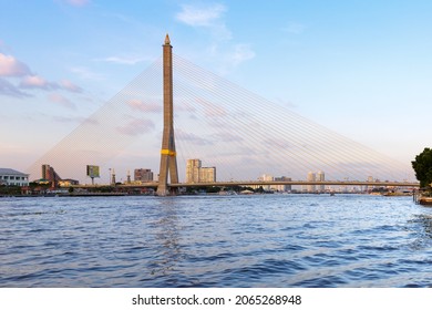 Bangkok, Thailand - December 02, 2019: Evening view of the Rama 8 Bridge in Bangkok. Cable-stayed bridge over the Chao Phraya River was built in 2002