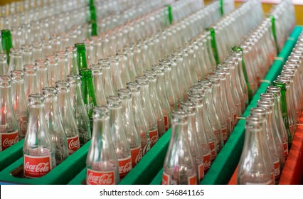 Bangkok, Thailand - December 11, 2016: Empty Coca Cola Bottles Kept In Factory Storage,