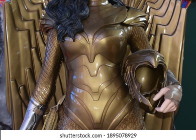 Bangkok, Thailand – December 11, 2020: Human Size Wonder Women Wearing Golden Eagle Armor Statue Of Movie Wonder Woman 1984 (Part 2) Displays At The Theater