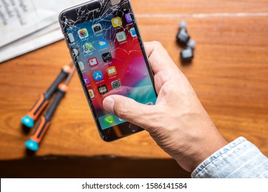 BANGKOK, THAILAND - DECEMBER 12, 2019: Broken iPhone 6plus with cracked screen.