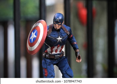 BANGKOK THAILAND - DECEMBER 17 ,2016 : Close up shot of Captain America Civil War superheros figure in action fighting. Captain america appearing in American comic books by Marvel.