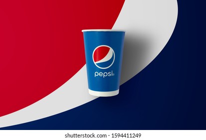 BANGKOK, THAILAND - December 18, 2019: Pepsi paper cup with new Pepsi logo on Pepsi poster background. Pepsi is a world famous carbonated soft drink. Illustrative editorial