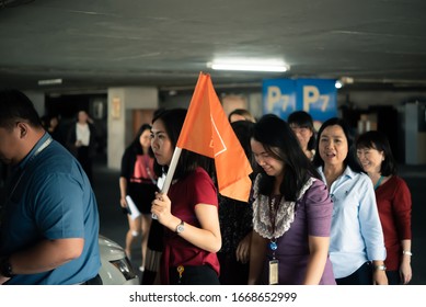 Bangkok, Thailand - December 20, 2019 : Many Working People Preparedness For Fire Drill Or Other Disaster At Office In Bangkok Thailand