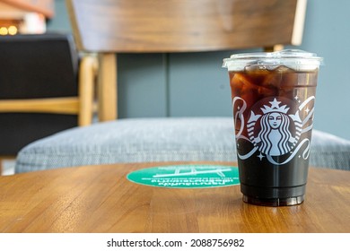Bangkok Thailand, December 2021,10. Iced Cold Brew Coffee in Starbuck Coffee cafe with copy sapce.