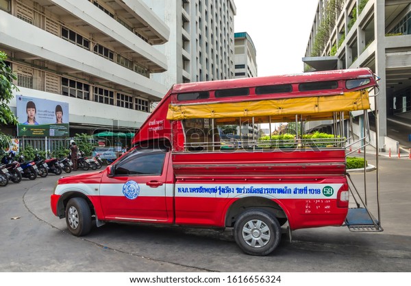 BANGKOK, THAILAND - December 23, 2018: A small\
bus in bangkok called Kapor offer an affordable way of getting\
around the city to see the real\
Bangkok.