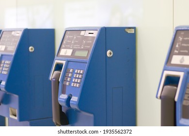 Bangkok, Thailand - December 26, 2020 : Coin-operated Public Telephone Booth. Blue Vintage Pay Phone Indoor. Retro Concept.