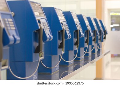 Bangkok, Thailand - December 26, 2020 : Coin-operated Public Telephone Booth. Blue Vintage Pay Phone Indoor. Retro Concept.