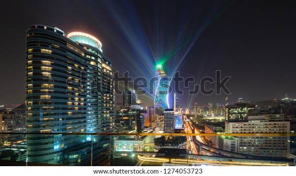 BANGKOK, THAILAND - December 27, 2018:\
Magnolias Ratchadamri Boulevard, Grand Opening Amazing Lighting\
with3D Projection Mapping on the\
Building.