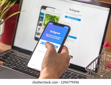BANGKOK, THAILAND - December 29, 2018: Instagram social media app logo on log-in, sign-up registration page on mobile app screen on iPhone smart devices in business person's hand at work - Shutterstock ID 1296779596
