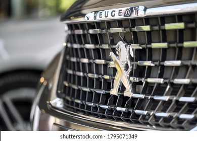 BANGKOK, THAILAND - DECEMBER 3, 2019: Front view Peugeot 3008. Close up on Peugeot logo on front grill. Sports utility vehicle & crossover model. French car brand, part of PSA Peugeot Citroen company