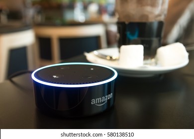 BANGKOK, THAILAND - Fabruary 2 : Selective focus on Amazon Echo dot version 2, the voice recognition streaming device from Amazon in coffee shop on Fabruary 2 2017 in BANGKOK, THAILAND