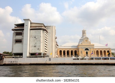 BANGKOK, THAILAND - FEB 12 : Chao Phraya river flows in front of the Royal seminary building in Bangkok on February 12, 2011. It is the principal river that flows through 365 km of land in Thailand.