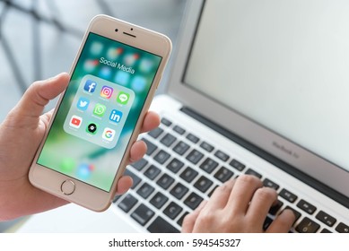 BANGKOK, THAILAND - FEBRUARY 06, 2017: Woman Using Iphone6 With Social Media Application Set On Screen