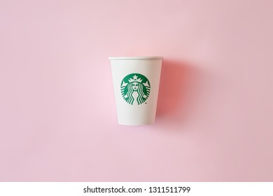 Bangkok ,Thailand - February 11 2019 : A Cup Of Starbucks Coffee With Logo Isolated On Pink Background