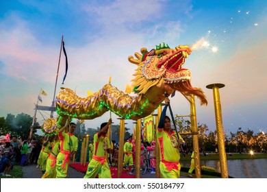 BANGKOK, THAILAND - FEBRUARY 20 2016: Unidentified group of people perform a traditional dragon dance at Rama IX public park to celebrate traditional Chinese's lunar new year
