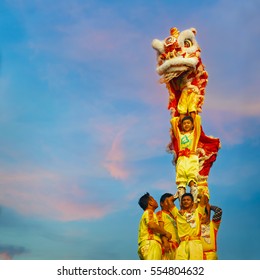 BANGKOK, THAILAND - FEBRUARY 20 2016: Unidentified group of people perform a traditional lion dance at Rama IX public park to celebrate traditional Chinese's lunar new year