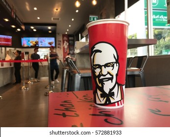 BANGKOK, THAILAND - FEBRUARY 6, 2017 : KFC logo on soft drink cup at KFC restaurant in Bangkok with depth of field.