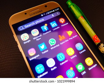 Bangkok, Thailand. February 8, 2018: Social Media Apps On A Gold Smartphone Screen. Facebook, Twitter, Linkedin, Instagram, Pinterest, Line, Whatsapp, Microsoft Apps, Google Apps. 