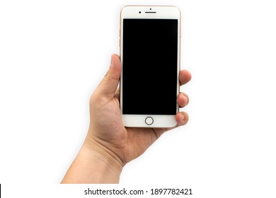 Bangkok , Thailand - Jan 12,2021 : hand holding phone mobile and touching screen isolated on white background.