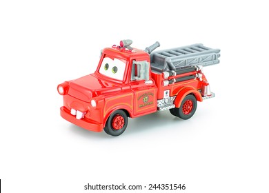 Bangkok, Thailand - January 11, 2015 : Tow Mater Toy Character From Pixar CARS Film. Product By Tomica In Red Mater Rescue Squad Tomy 2007.