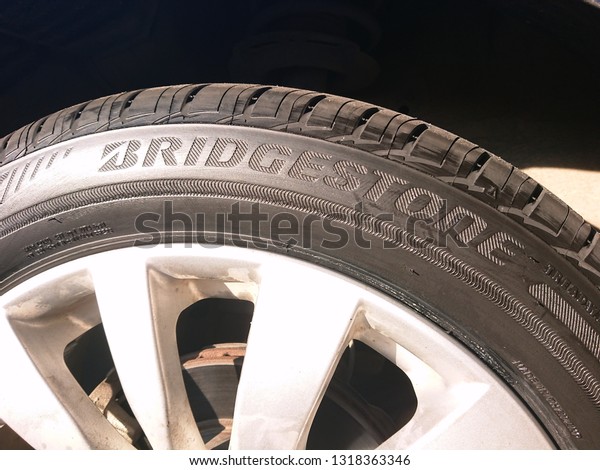 BANGKOK / THAILAND - JANUARY 13, 2019 :\
Bridgestone tubeless tyres on the magnesium alloy wheels rim, The\
most popular tire in\
market