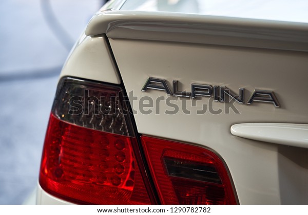 BANGKOK, THAILAND - JANUARY 18, 2019: ALPINA logo\
below rear spoiler with white paint & taillight detail after\
paint polish & coating. Car modification concept. High\
performance version of BMW\
car.