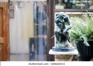 Bangkok Thailand - January 20, 2019 : Copy Of Small Statue The Thinker Man In Front Of The Shop In The Park