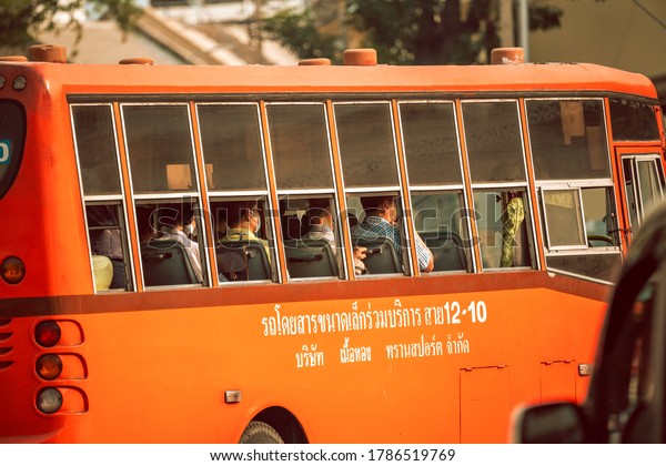 Bangkok, Thailand\
- January 2020: Typical transport vehicles in Bangkok, Thailand,\
bus, motorbike and carts. The traffic in asian city. Transport \
methods in the Thai cities.\
