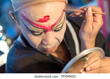 Bangkok, Thailand - January 21, 2015 : Actor Make Up For The Performance Chinese Opera. Chinese Opera Is An Ancient Drama Musical Way In China Town At Yaowarat District Bangkok, Thailand.