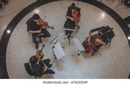 BANGKOK, THAILAND - January 30, 2017: A String Quartet, Play Classical Music, At The Bangkok Art And Culture Center.