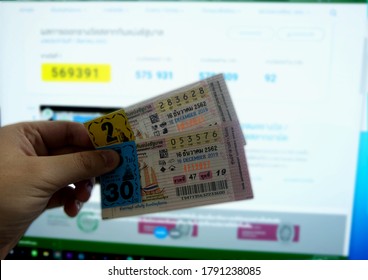 Bangkok, Thailand - Jul 05,2020 : Close Up Thai Lottery Tickets And Thai Calendars With Red Marked Of Check Out Lottery Date.