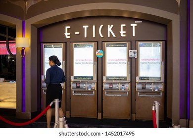 Bangkok, Thailand, Jul 14, 2019 - Woman Buying Movie Ticket From Ticket Machine