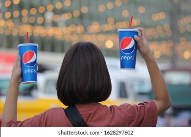 Bangkok, Thailand : July 07,2018: Young Woman Hand Holding Drink Pepsi On Street 