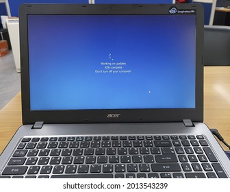 Bangkok, Thailand - July 1 2021 : Acer Aspire Laptop Computer Is Working On Updates Windows 10 64-bit OS.