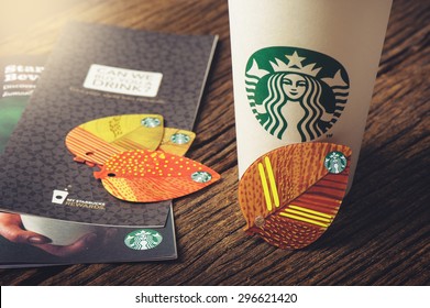 BANGKOK, THAILAND - JULY 15, 2015: The Starbucks Autumn Fall Leaf Shape Key Ring Gift Card.