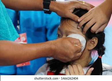 Bangkok, Thailand - July 27, 2019 ; Sport Event Named Heroes TaeKwonDo International Championship 2019. Nurse EMS First Aid Injuries Player Accident At Head Eye And Pain At Assumption University