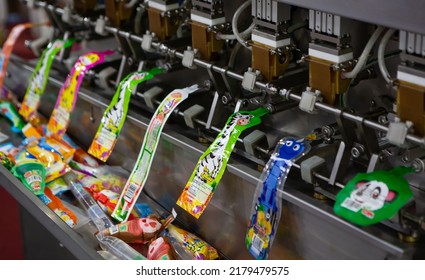Bangkok, Thailand - July 4, 2022: Food Liquid Nozzle Packaging Machine. Juice Pouch Filling Machine Exhibit In Food Pack Asia 2022.