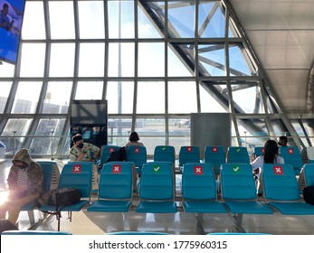 Bangkok, Thailand - July 8,2020 : Red Sticker Placed On A Chair At The Airport, To Control The Spread Of COVID 19 In Thailand.