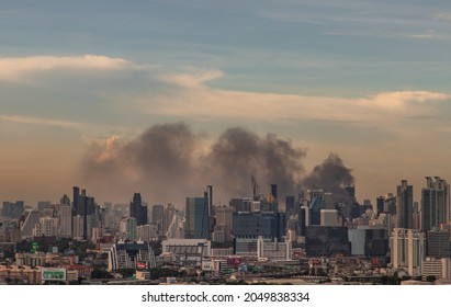 Bangkok, Thailand - Jun 23, 2020 : Aerial Photograph Of A Group Of Black Smoke Rising From A Fire On A Tall Building In Bangkok.