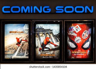 Bangkok, Thailand - Jun 26, 2019: Spider-Man: Far From Home movie poster with coming soon display showing in theatre. Cinema promotional advertisement, or film industry marketing concept